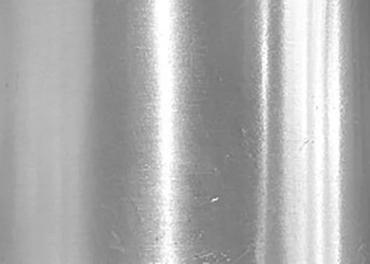 Close up of polished aluminum material used for Arkson Truck Co's Aluminum Tank Vacuum Trucks