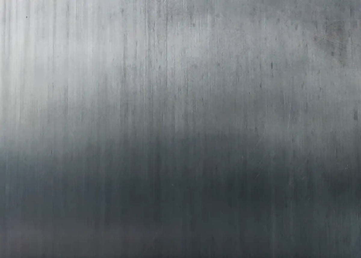 Close up of carbon steel material used for Arkson Truck Co's Steel Tank Vacuum Trucks