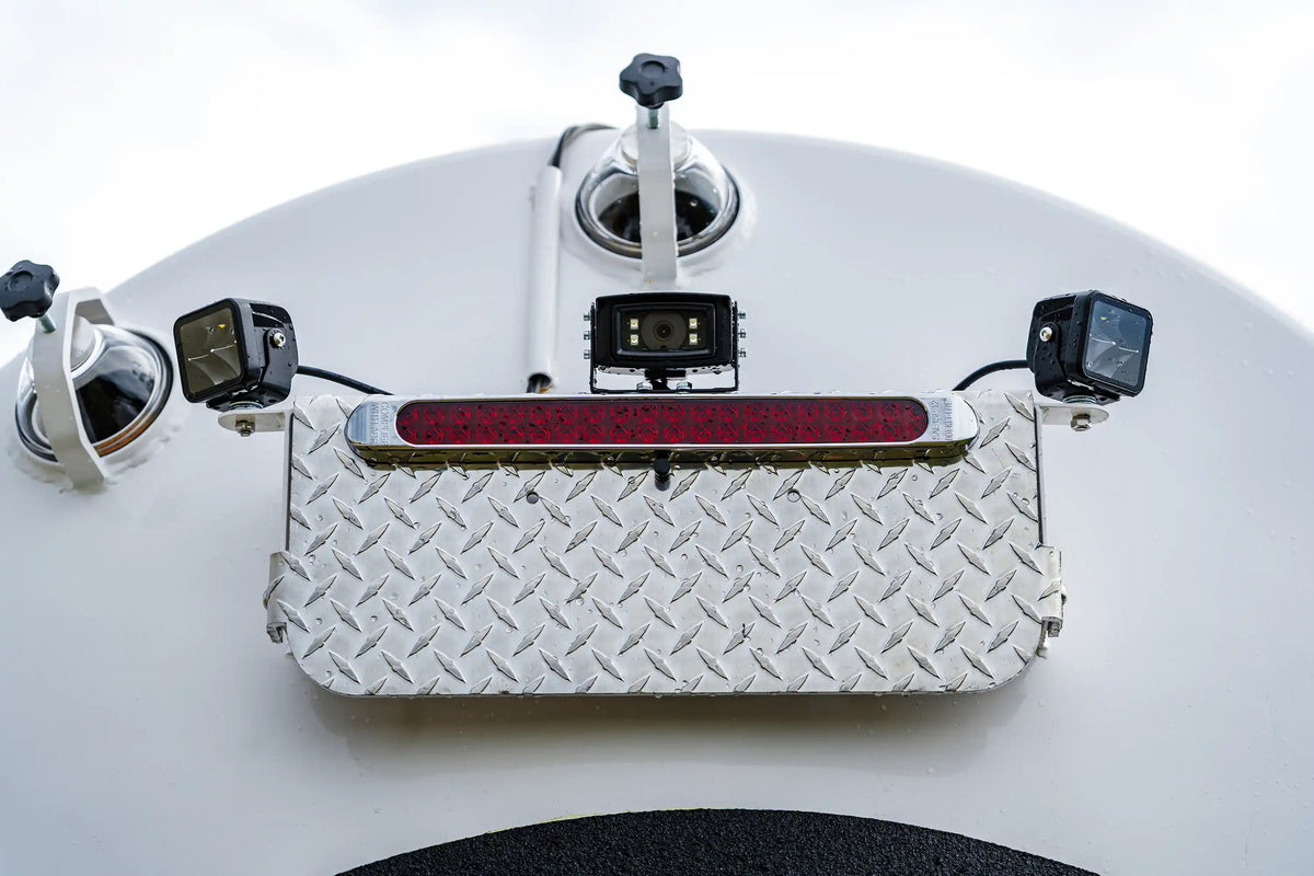 Close up of the rear LED Lighting Package on the 2026 International MV-607 1900 Gallon Vacuum Truck for sale from Arkson Truck Co